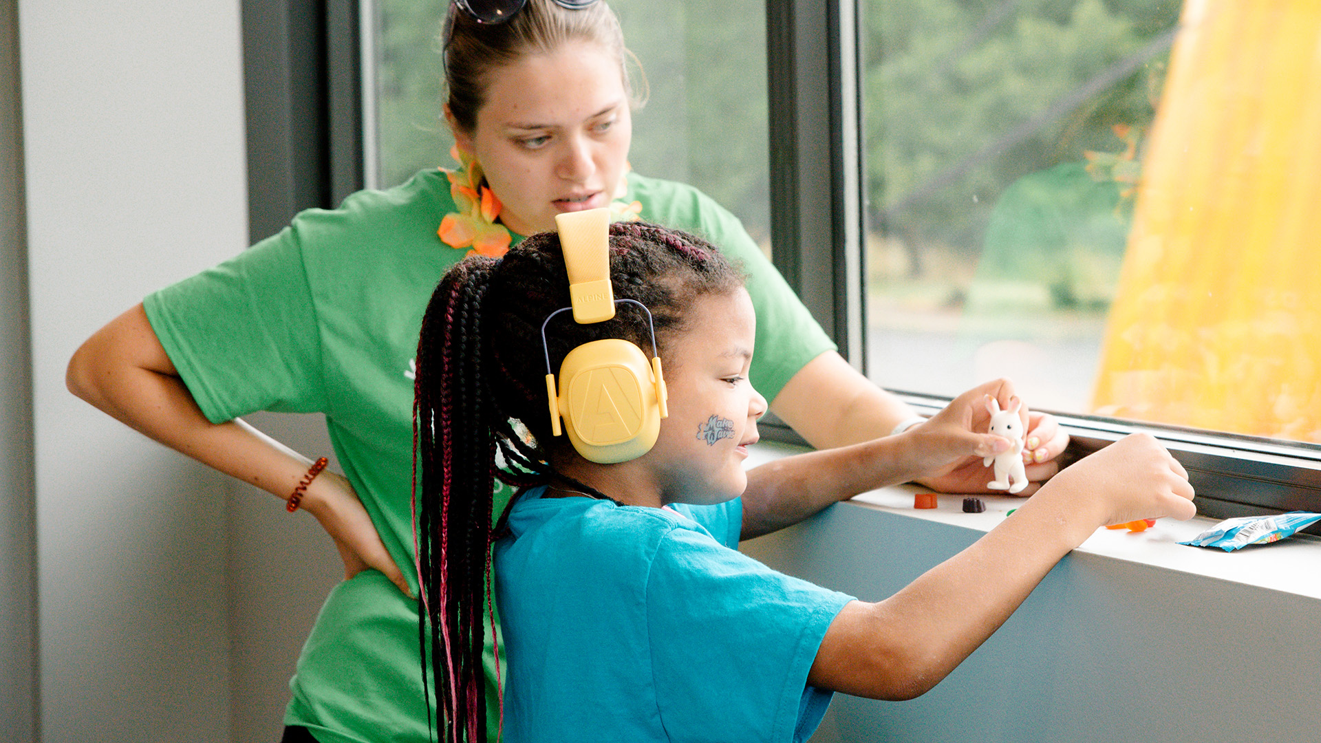 Image of a volunteer and autistic child at a church in Sewickley