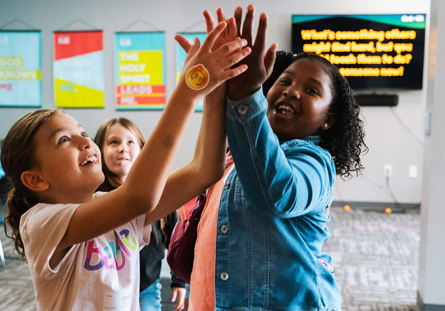 Girls catching a ball at North Way Kids Sewickley Valley