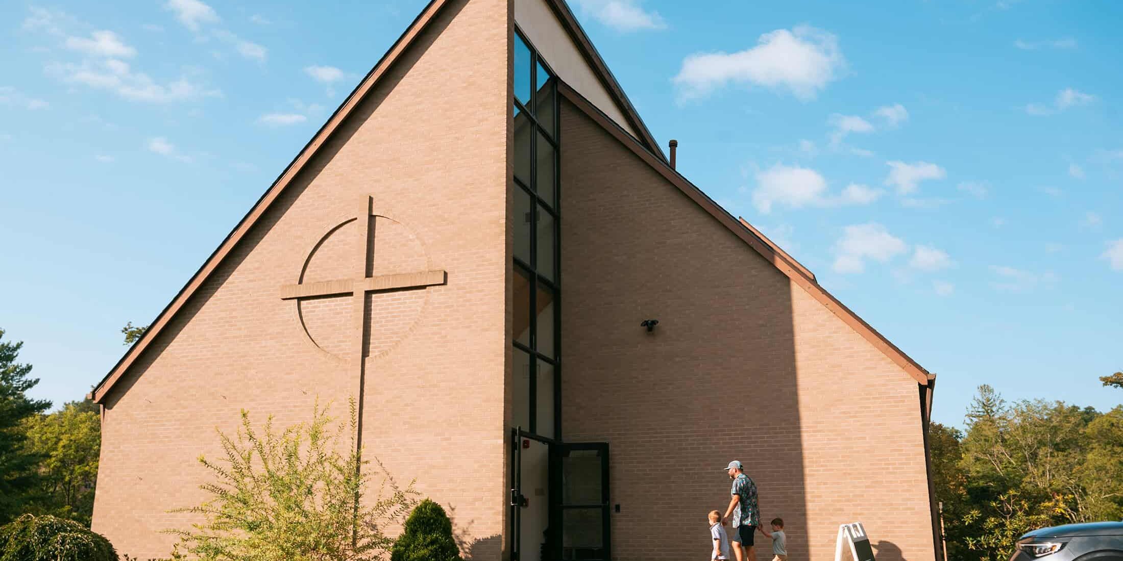 A family entering the South Hills Campus building