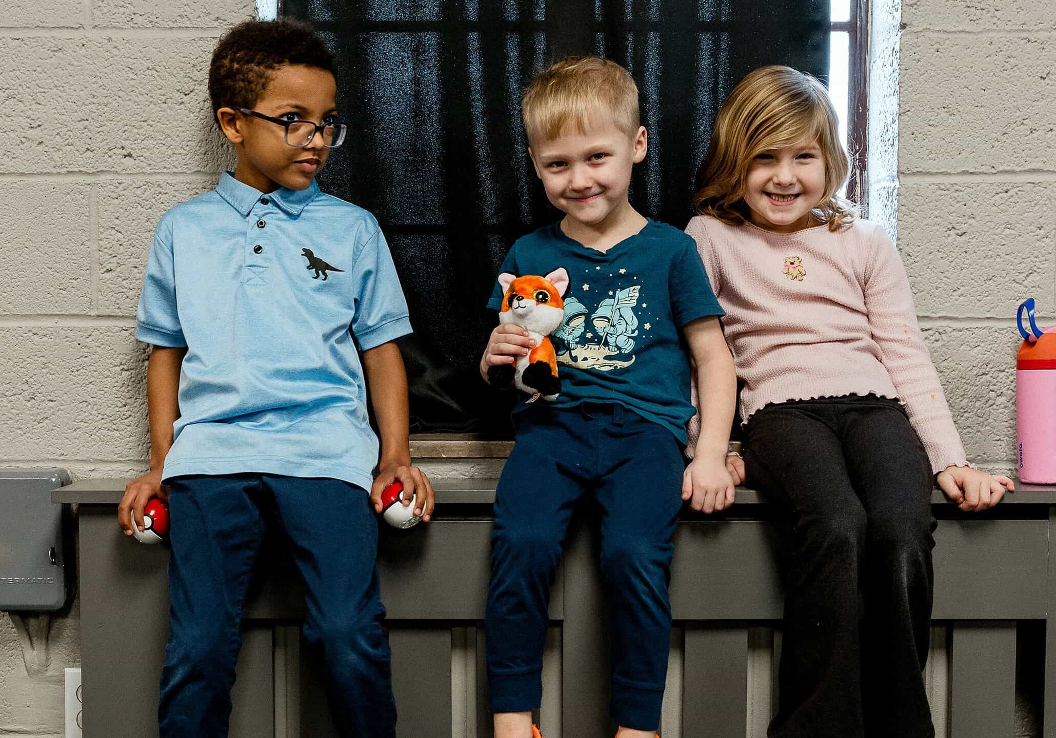 Kids smiling at North Way Kids in Dormont, PA