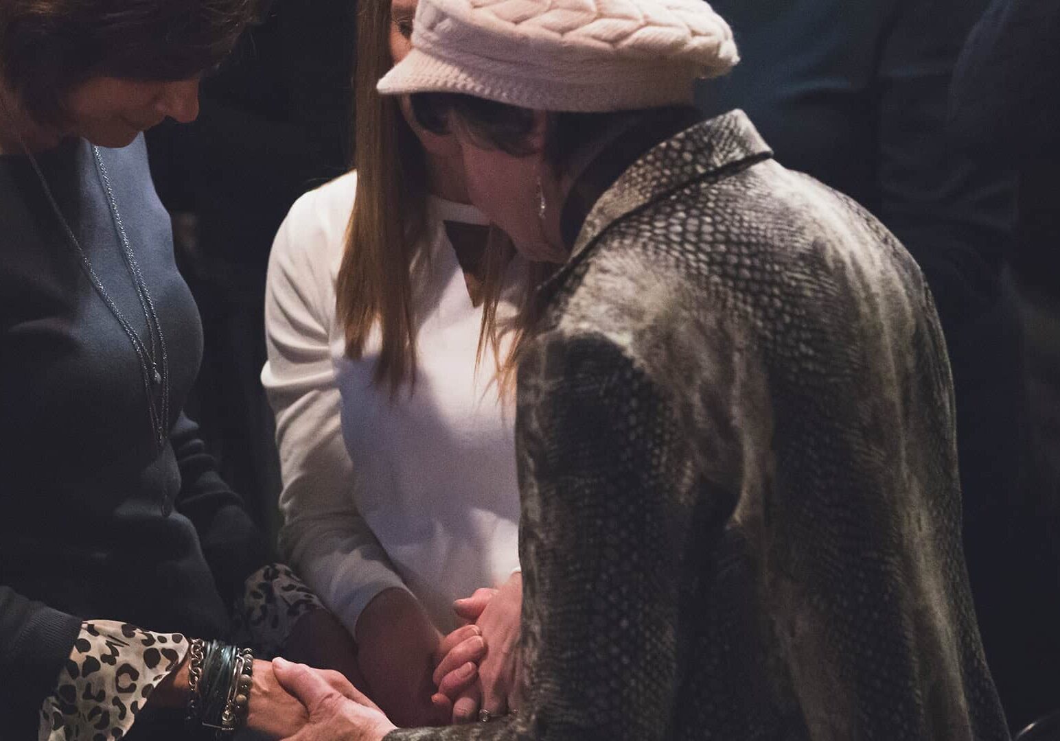 Women praying together