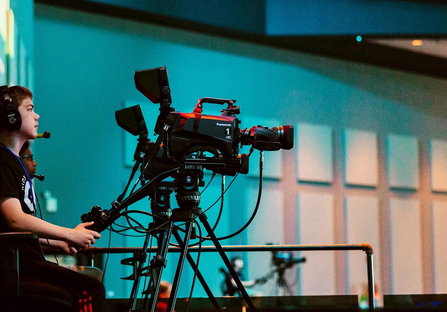 North Way student running the camera at KidsGiG.