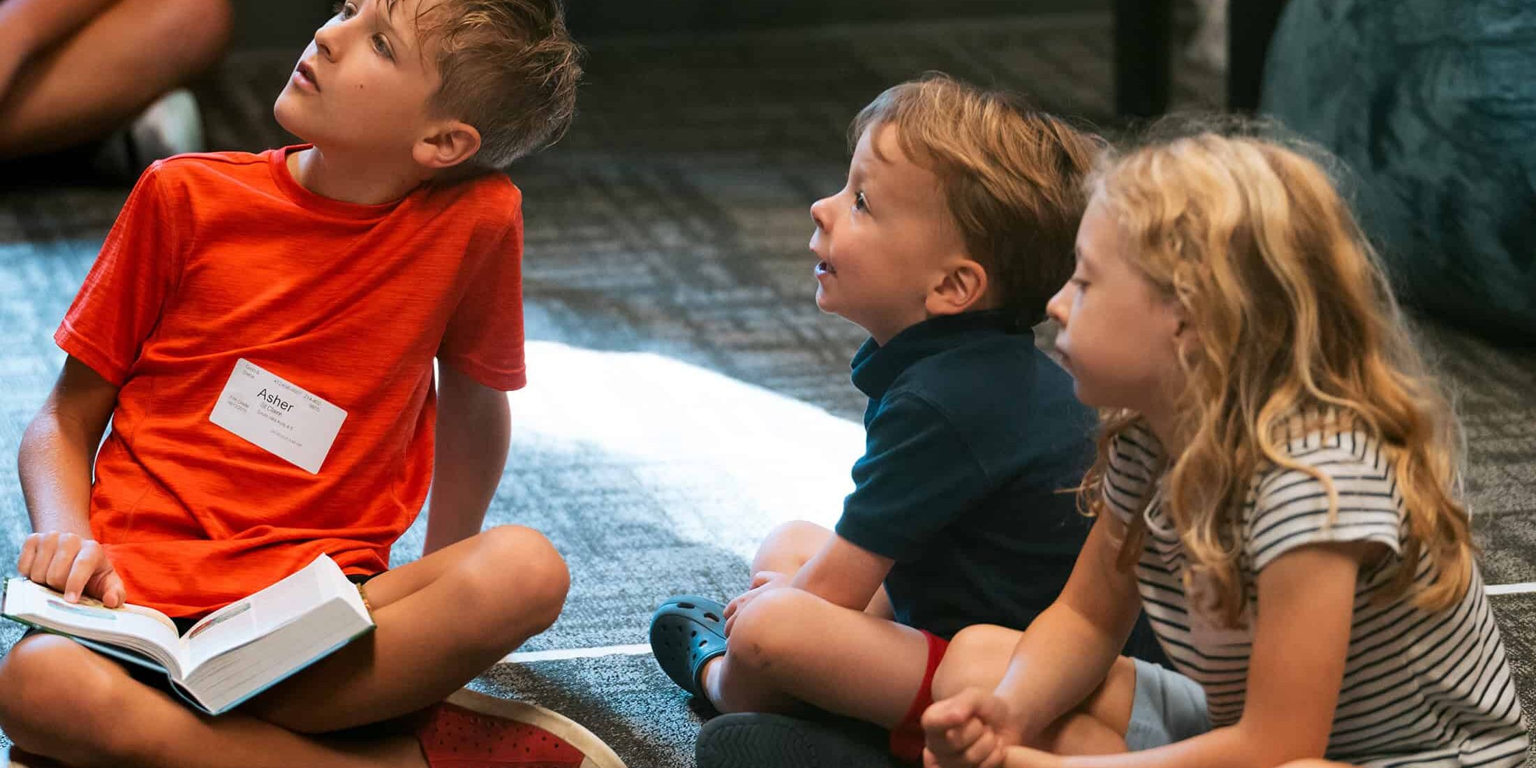 Kids listening to a bible story at North Way South Hills Kids Church