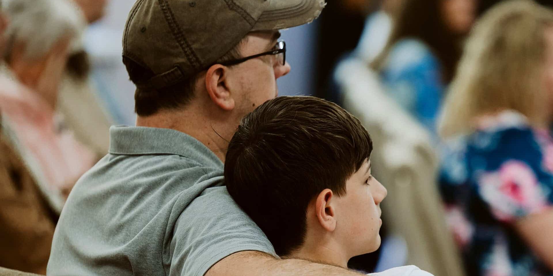 Father and son attending worship service at North Way South, a non-denominational, Christian Church in Peters Township, South Hills, PA
